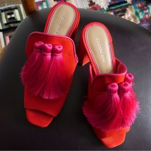 Red leather Gianni Bini mules with magenta tassels